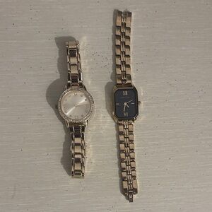 Set of 2 gold tone watches one is Anne Klein and one is a Walmart watch